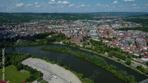 An aerial panorama view around the old town of the City Aschaffenburg In Germany on a cloudy spring day