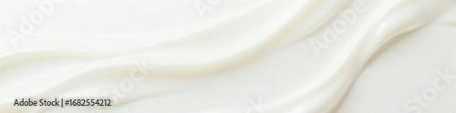 Luxurious, creamy cascade of white liquid pouring down, creating a smooth, delectable texture against a clean background Ideal for food, beauty, or abstract concepts , smooth, marketing
