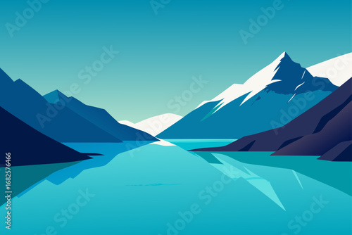 Serene mountain landscape with a calm lake reflecting the snow capped peaks and clear blue sky