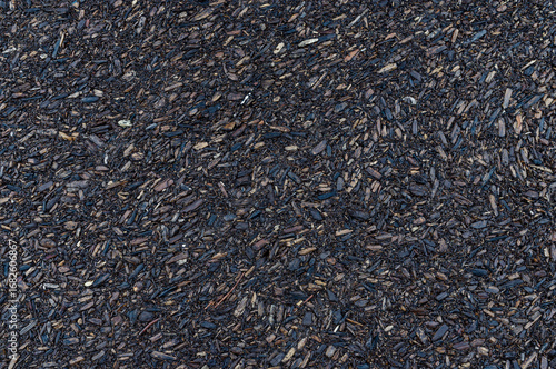 Dark wood chips mulch texture