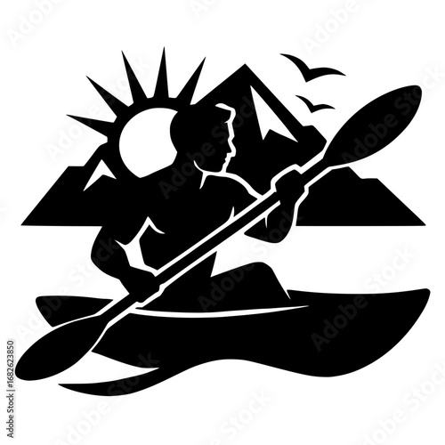 silhouette of a man kayaking