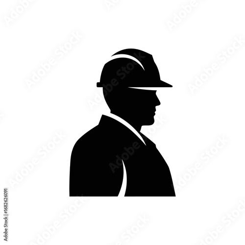 Silhouette of a man wearing a hardhat.