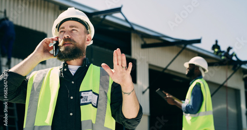 Construction, business or man on site with phone call, building failure or project delay. Communication, contractor or person in contact with engineer, safety issues or property development feedback
