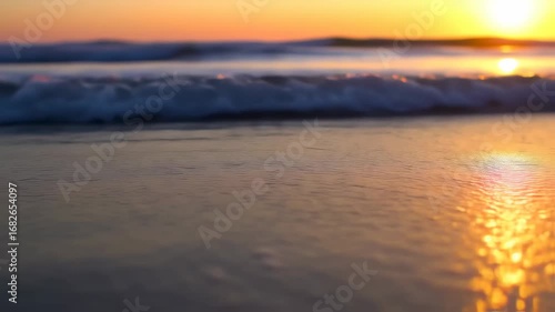Wallpaper Mural Golden Hour Serenity: Tranquil Waves Gently Washing Ashore at Sunset on a Peaceful Beach Torontodigital.ca