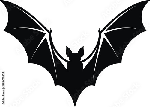 A striking black silhouette of a bat with wings spread wide in flight silhouette