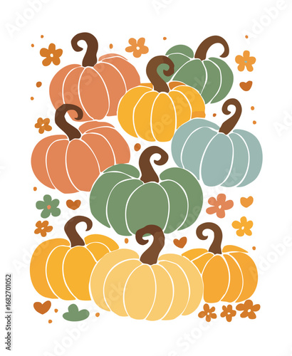 A collection of pumpkins in various fall colors with small floral accents autumn