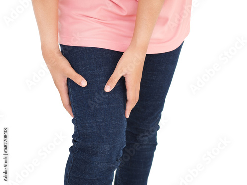 Woman feeling pain or having thigh cramp. 