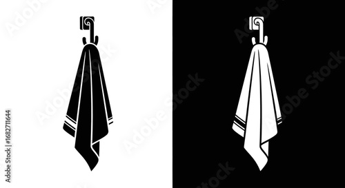 A towel hanging on a hook, a black and white split icon for a bathroom, a spa, a salon, or a hotel.