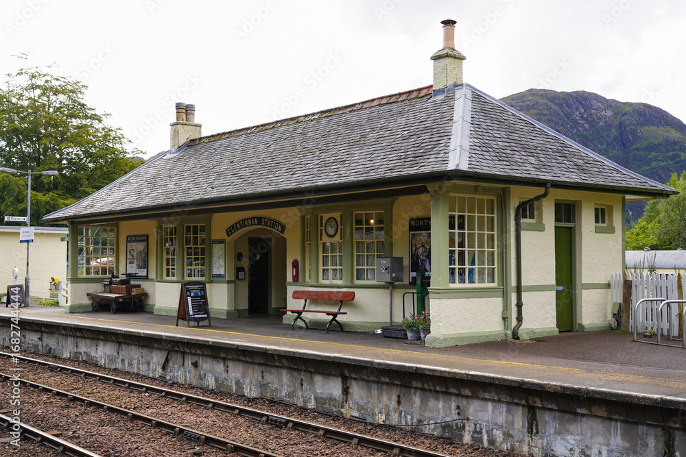 Naklejka premium Glenfinnan, Scotland - September 05 2022: The Glenfinnan railway station in Scotland. It is part of the West Highland Line.