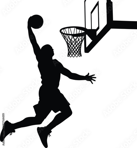 Silhouette of a basketball player performing a slam dunk
