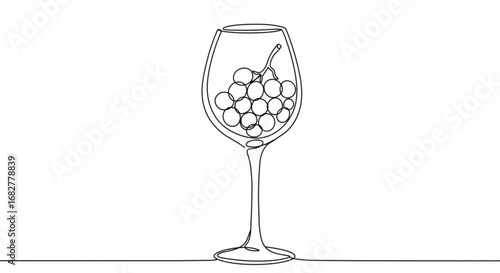 Wine glass with grapes