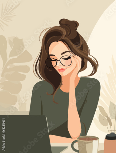 A woman with long brown hair is thoughtfully working on her laptop in a warm, inviting space. She has glasses on and a cup of coffee nearby, immersed in her task.
