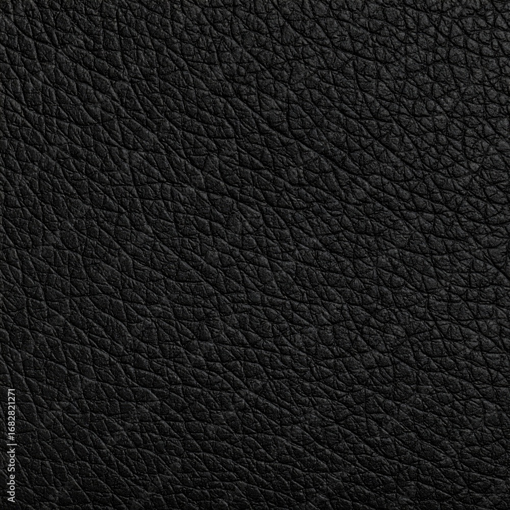 Fototapeta premium A close-up showcases a textured, dark surface with deep, intricate patterns. The rough grain gives it a tactile, organic quality. Monochrome and detailed