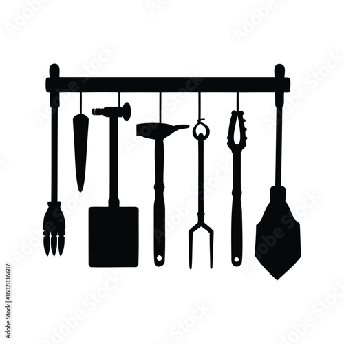 Blacksmith tools hanging on a rack, presented as a silhouette image, hanging tools wall silhouette vector illustration