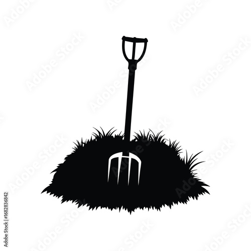 Silhouette of pitchfork standing in a mound of grass on white background, hay fork silhouette vector illustration