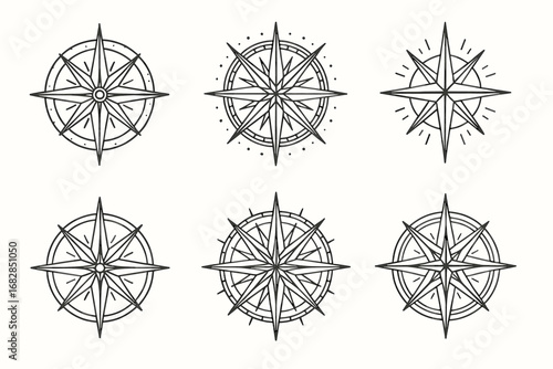 Set of six decorative compass rose designs with intricate patterns