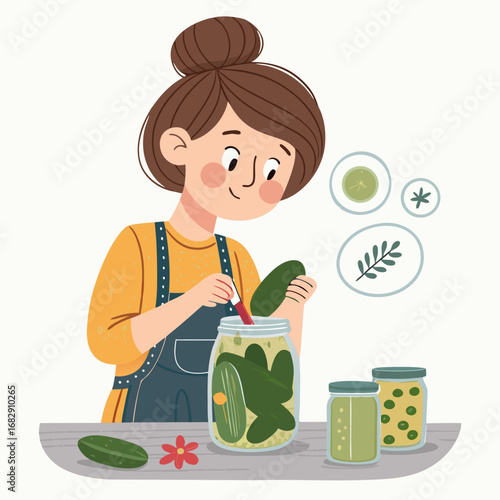 A young woman in an apron is pickling cucumbers in a glass jar.