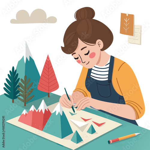Creative woman crafting a paper mountain landscape.