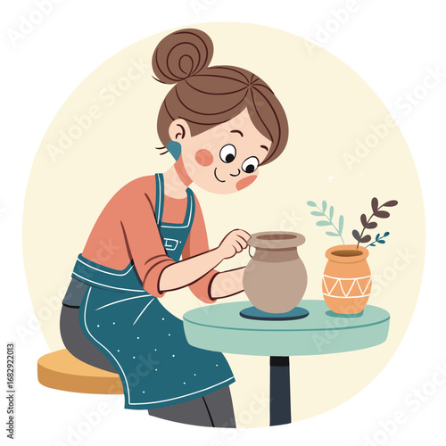 Female artist creating a clay pot on a potters wheel.