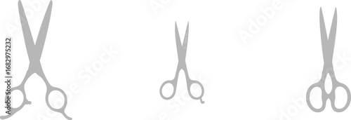 Three Gray Barber Scissors on White Background hair