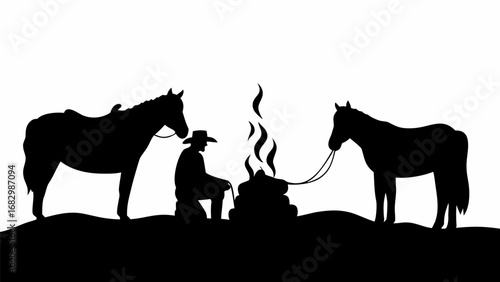 Silhouette of cowboy by campfire with two horses in a monochrome outdoor scene under a white background