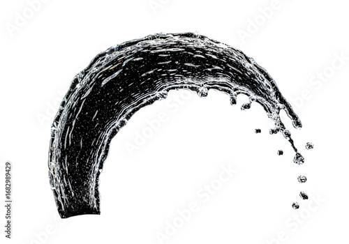 A graceful arc of water splashes against a black backdrop, showcasing the dynamic movement and intricate details of liquid motion.