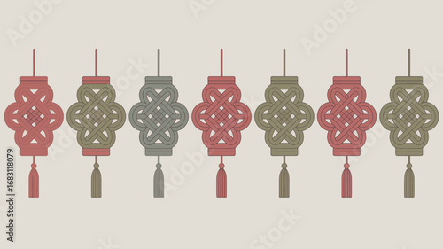 A row of decorative lanterns in alternating colors of pink and green with tassels hanging below them