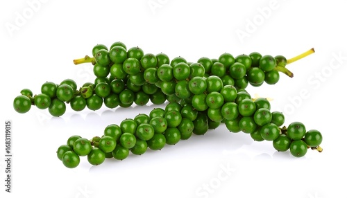 Fresh green peppercorns on a white background