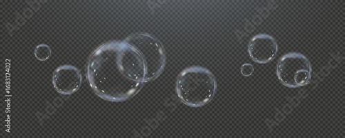 Realistic soap vector bubbles png isolated on transparent background. The effect of falling and flying bubbles. Glass bubble effect.	
