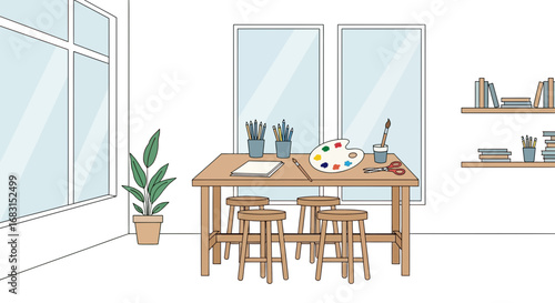 A vibrant and inviting artist's studio setup with natural light and creative tools