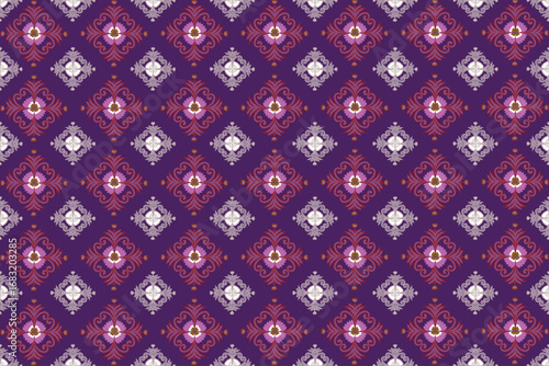 Purple textile pattern featuring diamond shapes with floral motifs, combining traditional elegance and symmetry in a repeating geometric design.