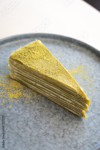Matcha cake om a plate close up 