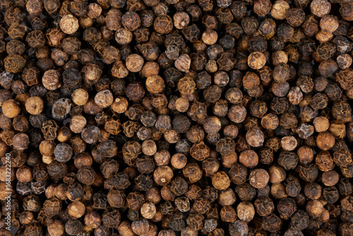 black pepper corns background © David Kreuzberg