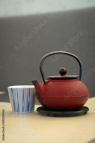Traditional Asian teapot with cup.