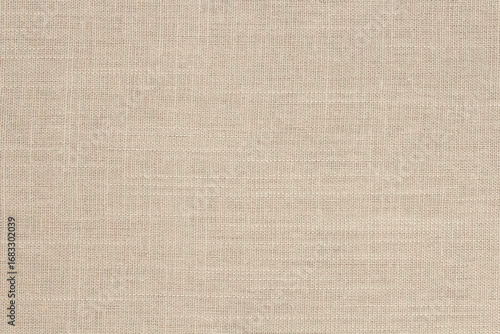 Brown linen fabric cloth texture for background, natural textile pattern.