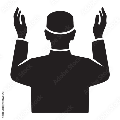 Person praying in silhouette