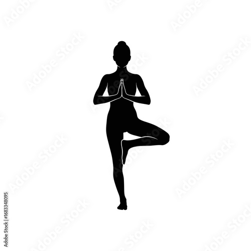 Silhouette of a woman performing the Vrksasana yoga pose, also known as the Tree Pose.