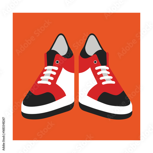 Pair of red white and black athletic sneakers shoes