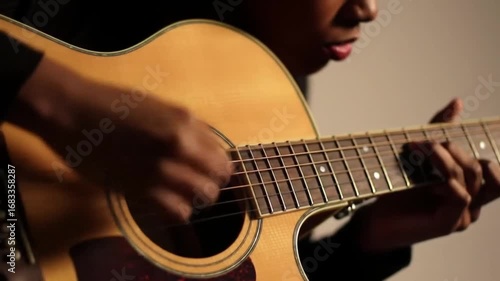 vibrant_Musician_passionately_playing_acoustic_gui_204