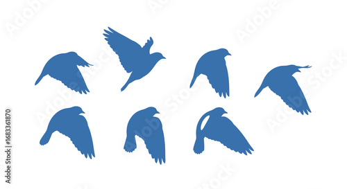Graceful blue bird silhouettes soar and glide, capturing the freedom and beauty of flight in motion