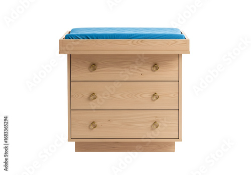 Light beige wooden dresser with three drawers and a light blue changing mat top, displayed against a dark background.