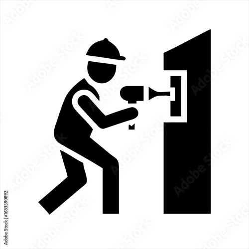 Worker using a drill on a wall installation icon