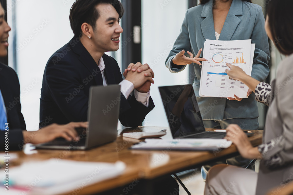 Fototapeta premium Meeting with a business consultant is discussing analyzing the sales situation and planning the company's finances. Strategy analysis and business planning.