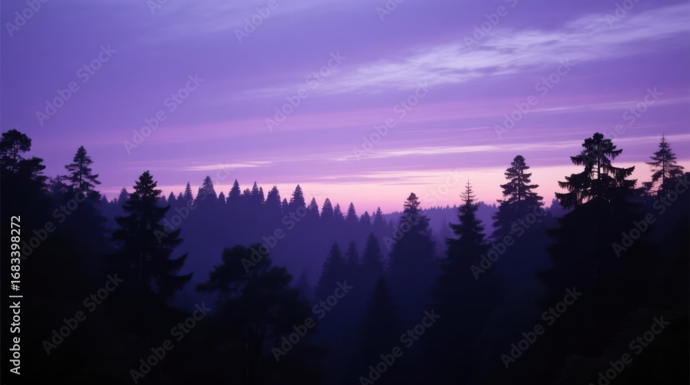 Fototapeta premium Silhouetted forest at twilight, purple hues