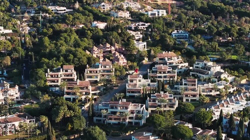 Wallpaper Mural Aerial view luxury hillside apartments residential community Mediterranean architecture homes villas Portugal Algarve coastal real estate development Torontodigital.ca