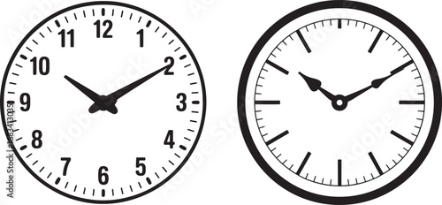 Two clock face displays the time with clear, black hour and minute hands on a white background