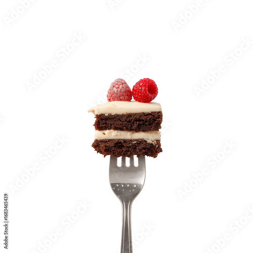 Delicious chocolate cake slice with raspberries on fork against a dark background perfect treat