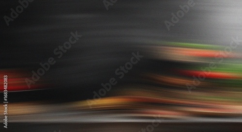 Blurred Motion Abstract Background with Red Green Yellow and Dark Tones motion blur