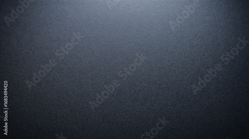 Matte black shimmer paper with subtle iridescent blue glow creates smooth textured background, perfect for elegant and modern design projects with calm and sleek feel