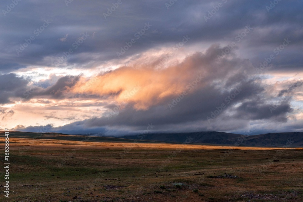 Fototapeta premium Altai, Ukok Plateau. Clouds after a thunderstorm.